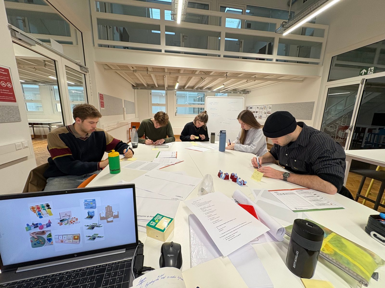 Idea generation session around a large table
