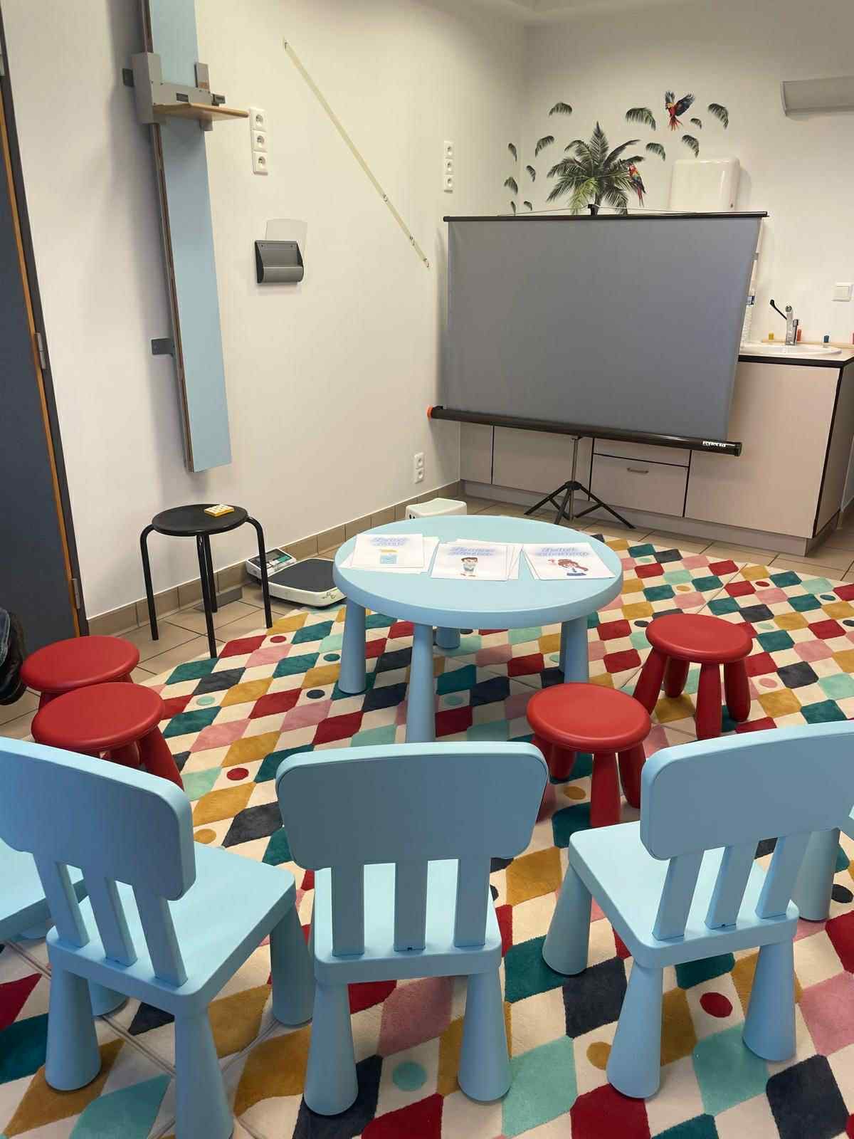 Child-friendly room set up for a focus group with hero cards on the table