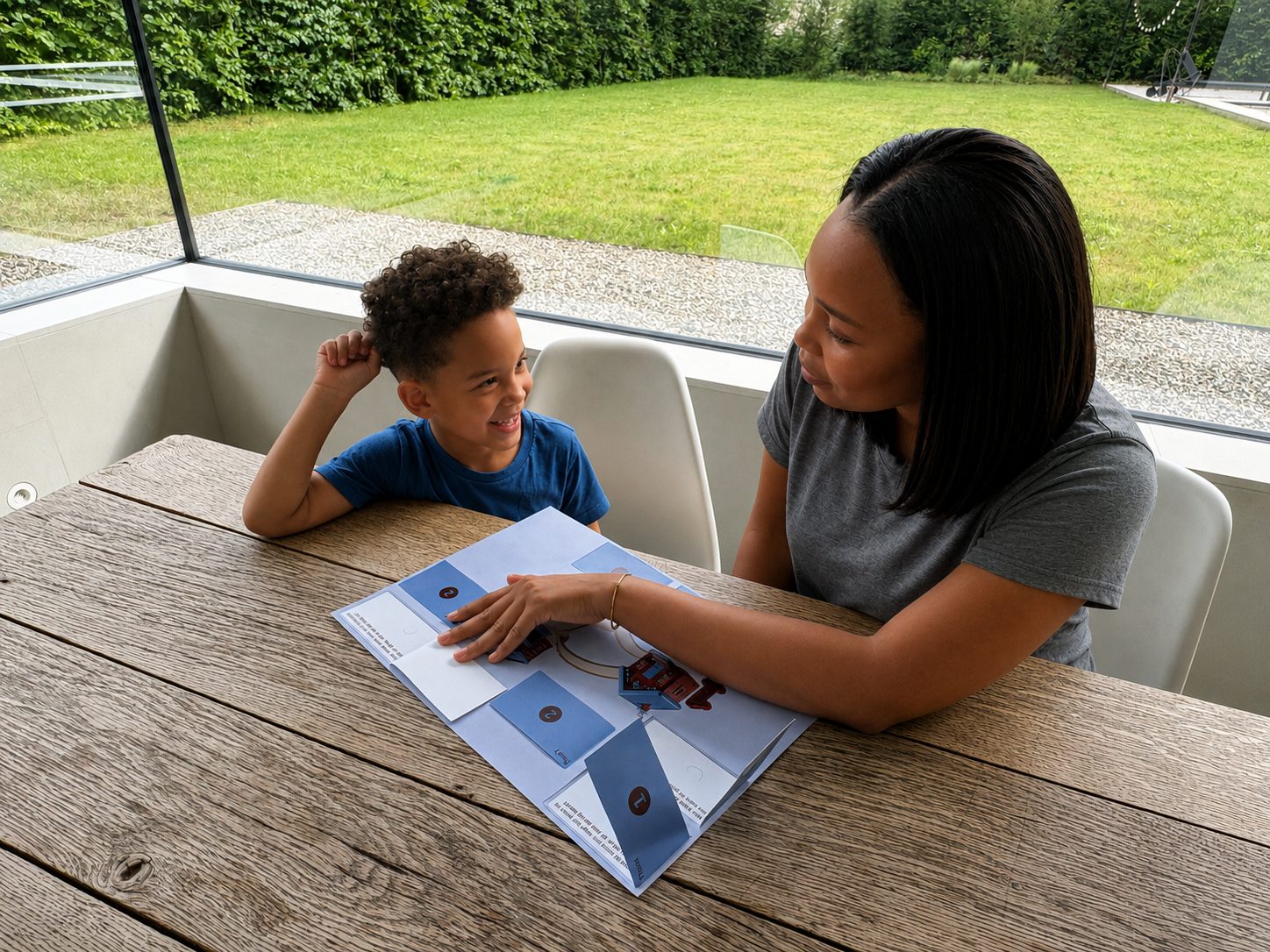 Parent and child going through the question sheet together