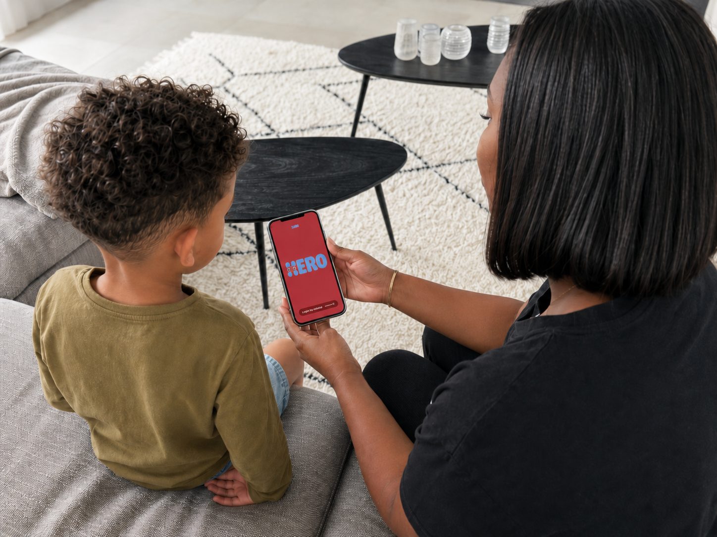 Parent and child opening the HERO app together
