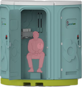 Festival attendee seated inside a cabin